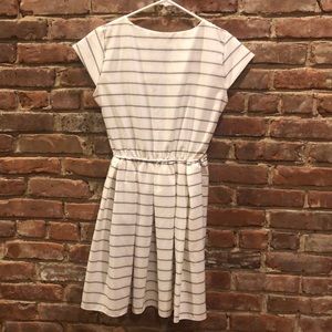 White striped dress with a bow in the back